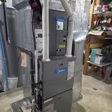 A furnace and venting in a utility room